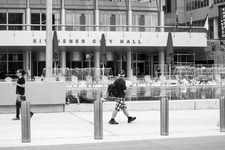 Photo by Jeffrey Robb: https://www.pexels.com/photo/a-person-walking-near-the-kitchener-city-hall-in-ontario-canada-13663499/