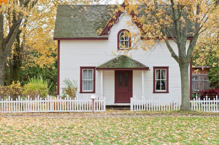 Photo by Scott Webb: https://www.pexels.com/photo/white-and-red-wooden-house-with-fence-1029599/